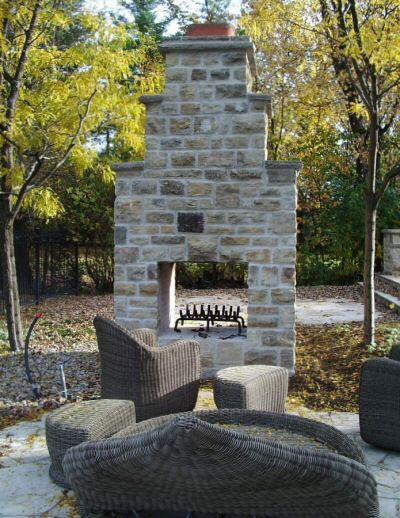Outdoor fireplace by Colin Coveny