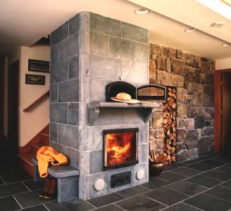 Custom soapstone masonry heater by Rod Zander
