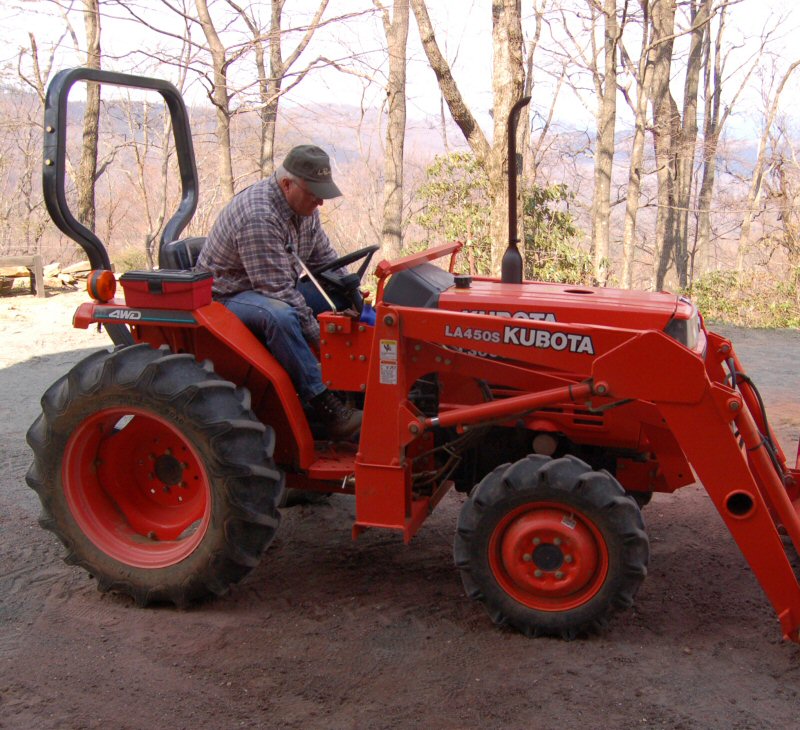 Dave Moore on a tractor